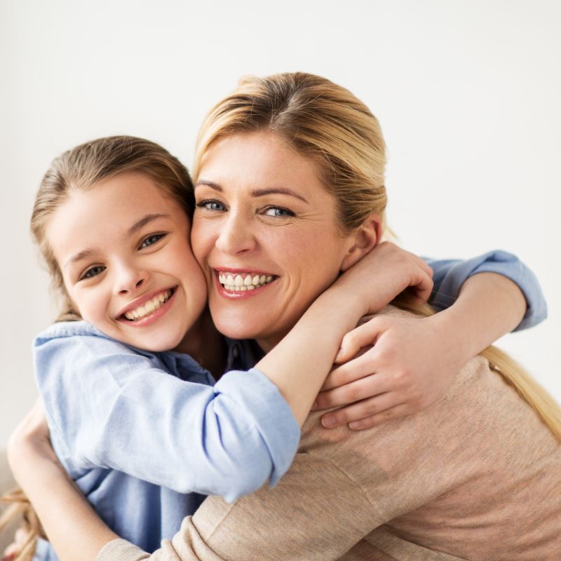 Mom and daughter hugging